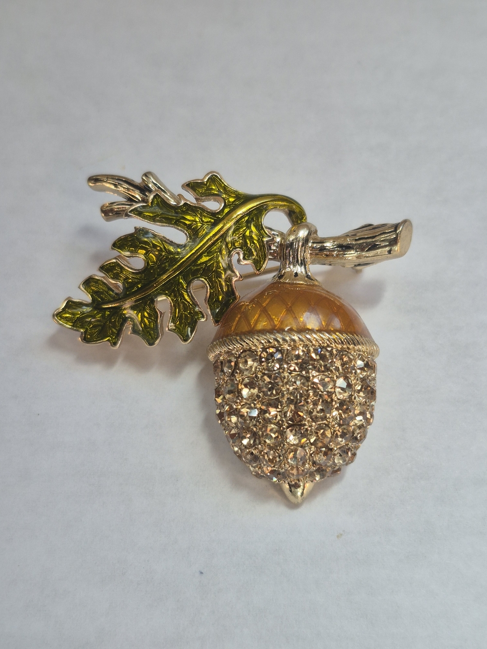 Enamel and rhinestone acorn brooch